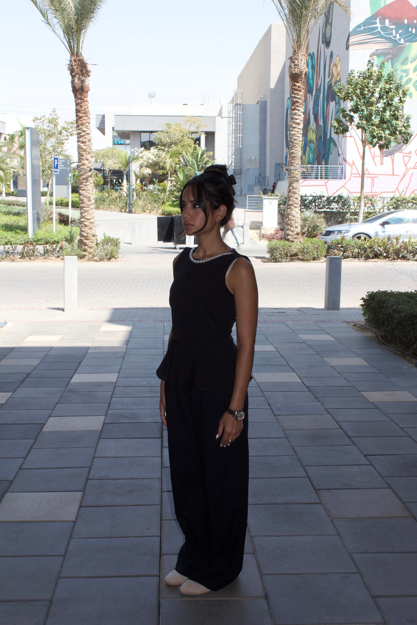 Black Sleeveless Peplum Top