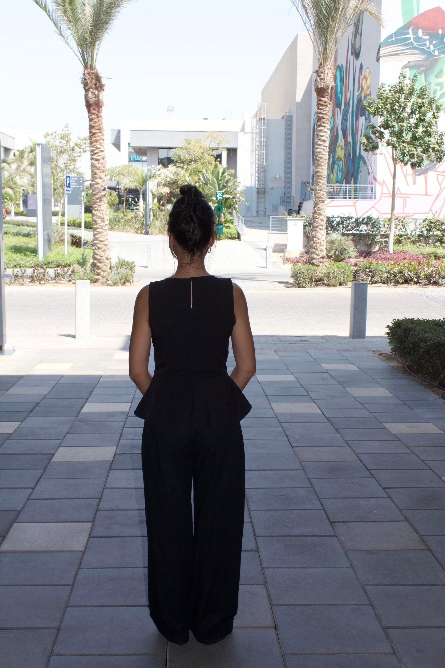 Black Sleeveless Peplum Top